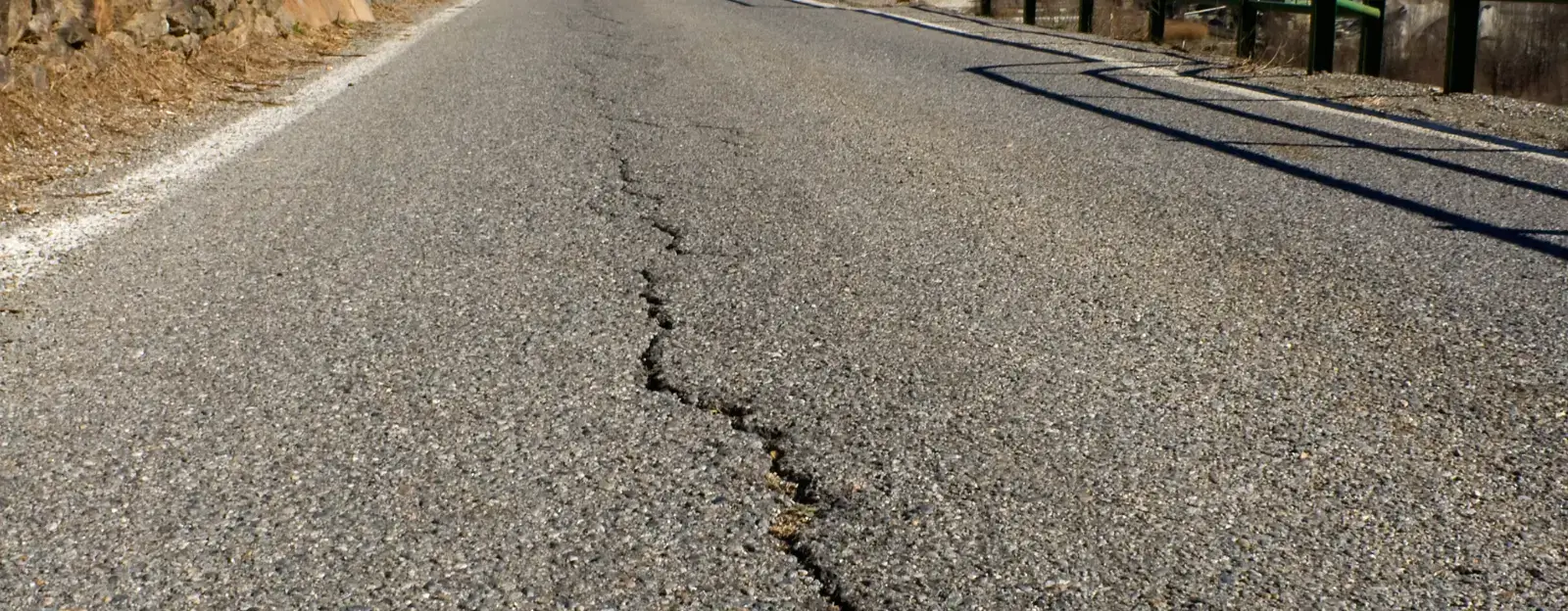 Wheel-path road cracking